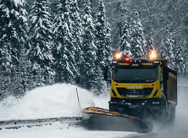 Gritting vehicle removes snow from the roads