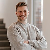 A friendly and smiling sales representative from geoCapture